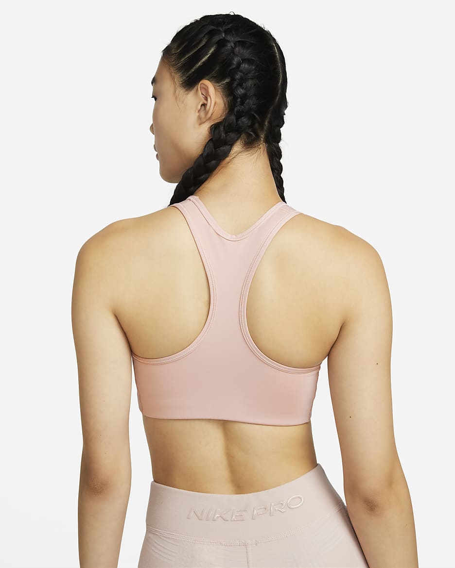 Nike Swoosh Women s Medium Support Non Padded Metallic Graphic Sports Bra. Nike ID